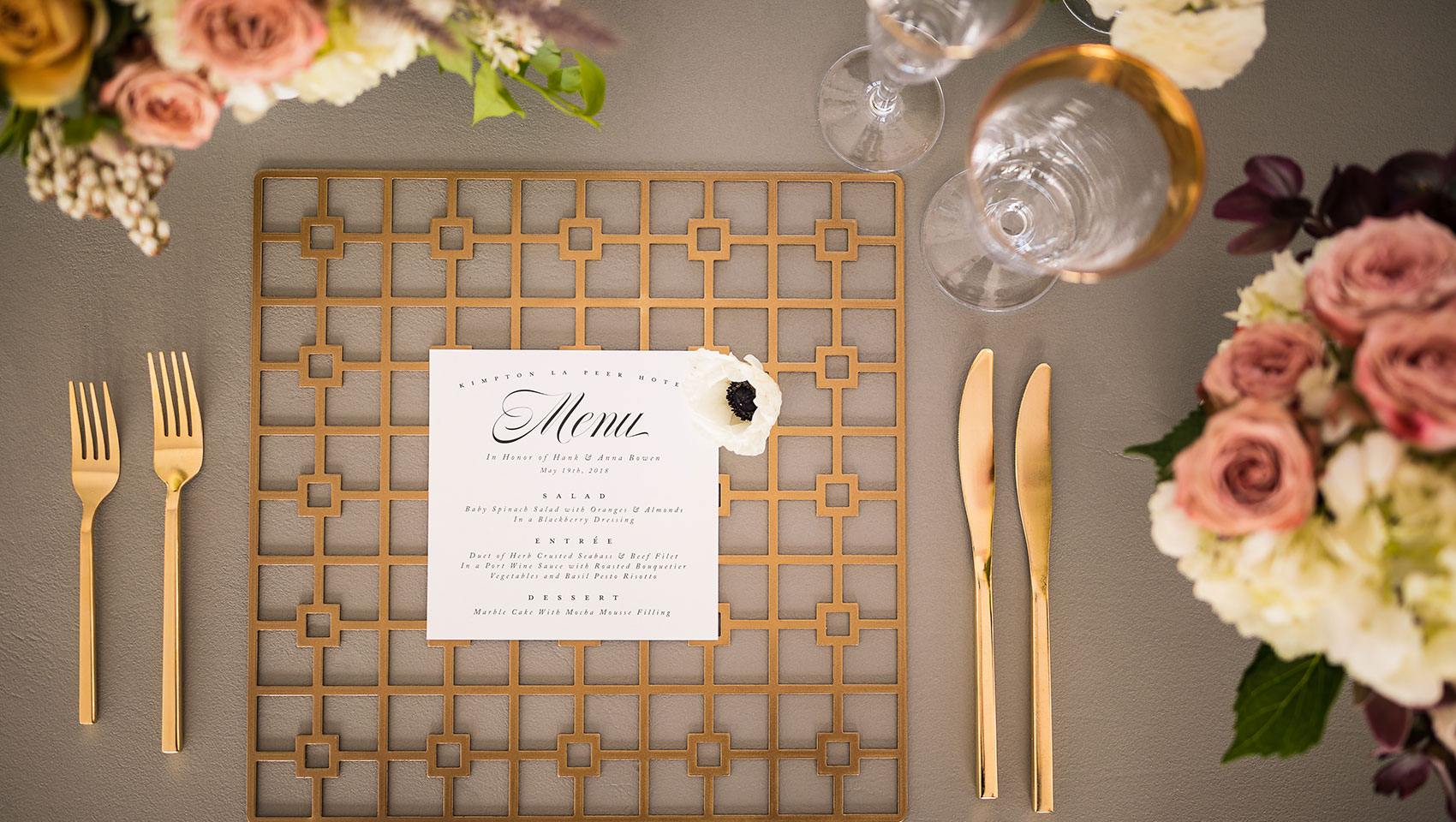 menu with cutlery and flower decorations around
