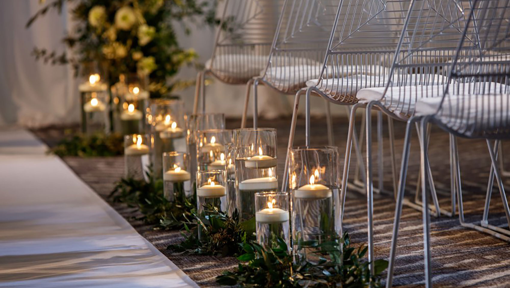wedding guest chairs and candle floral decorations